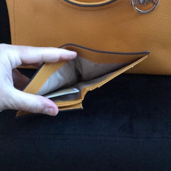 Authentic MK KIMBERLY W/matching wallet color Marigold